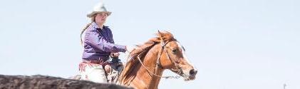 A girl riding a horse